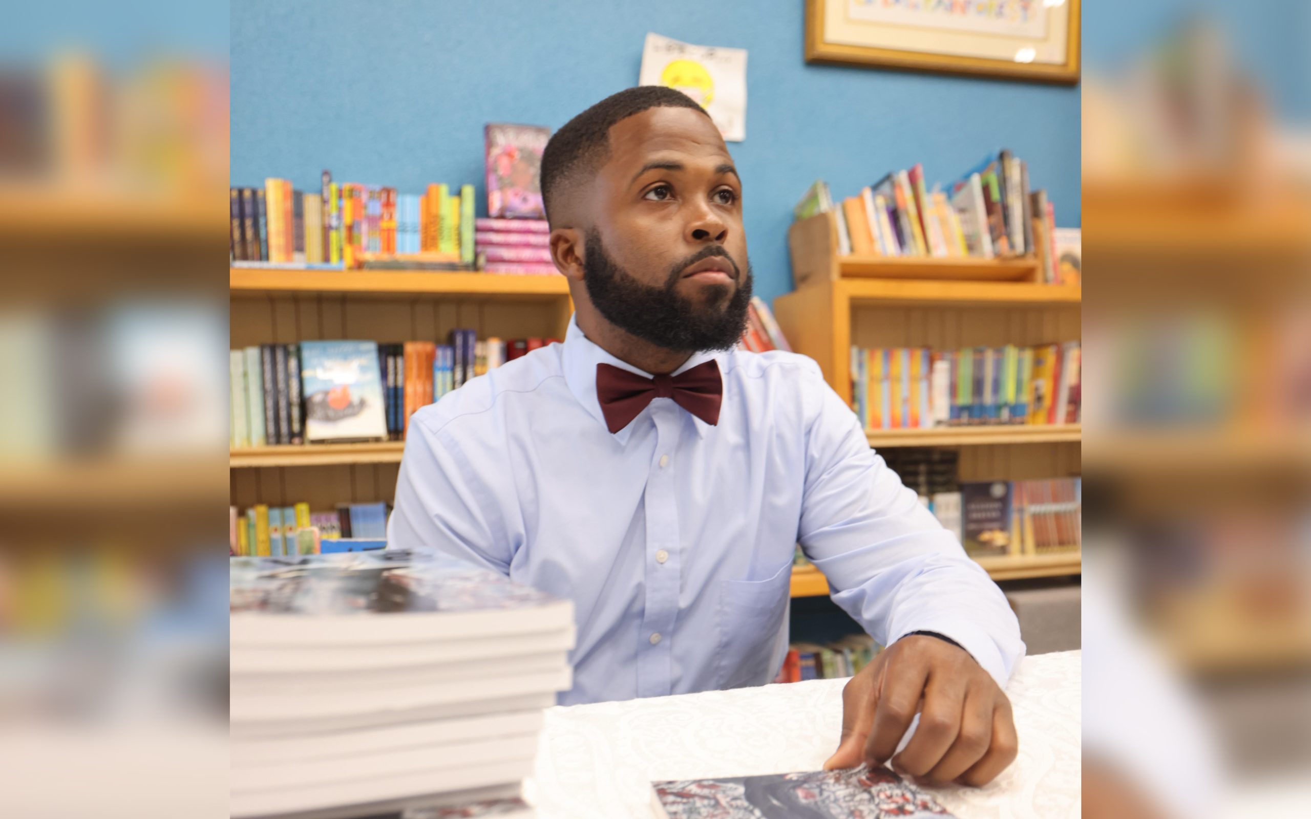 Carl Cavalier in a library